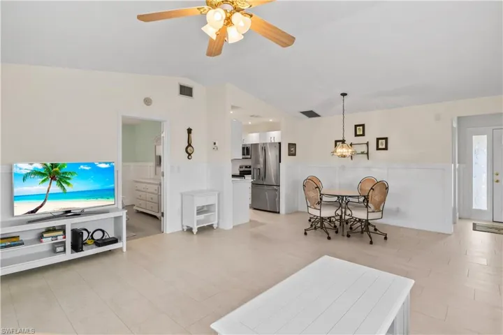 Well-appointed dining room designed for comfort and versatility, ideal for formal dinners or casual gatherings.