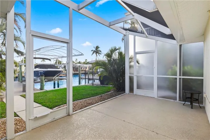 Peaceful canal views from your private backyard, perfect for relaxing or entertaining.