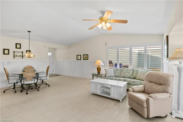 Expansive windows fill the home with warm, natural light, creating a bright and inviting living space.