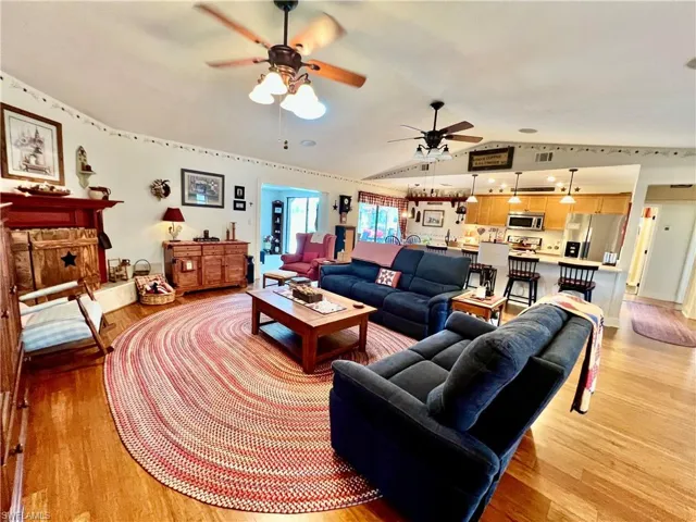 Living room with cathedral ceilings.