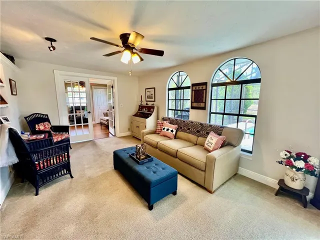 Extra living area in the family room overlooking the pool area.