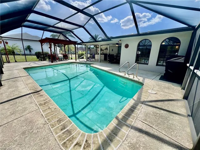 Screen enclosed in ground pool