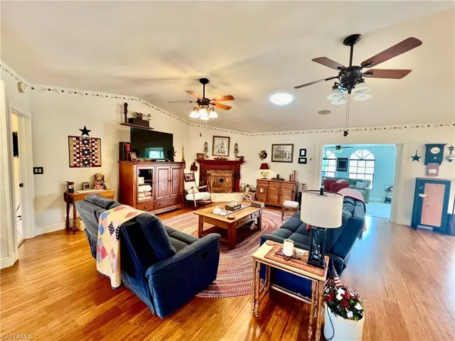 Living room with cathedral ceilings.
