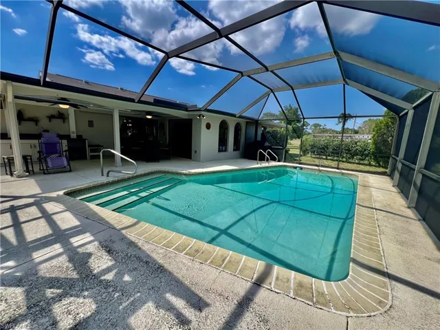 Screen enclosed in ground pool