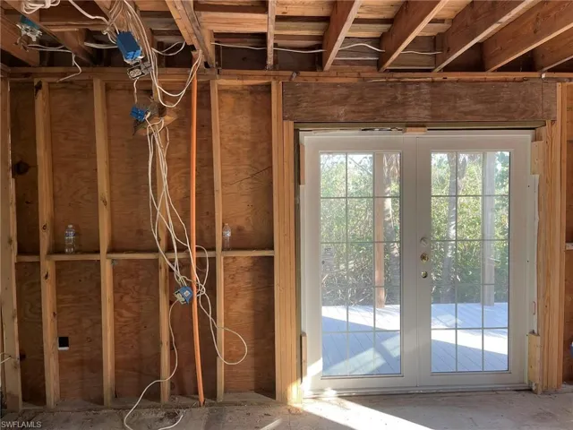 Primary Bedroom with French Door to 1st Level Balcony