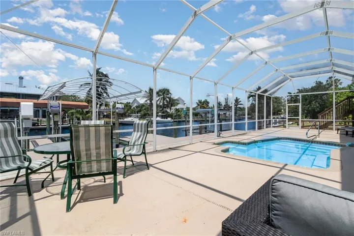Huge Pool Cage with  plenty of deck space for entertaining!