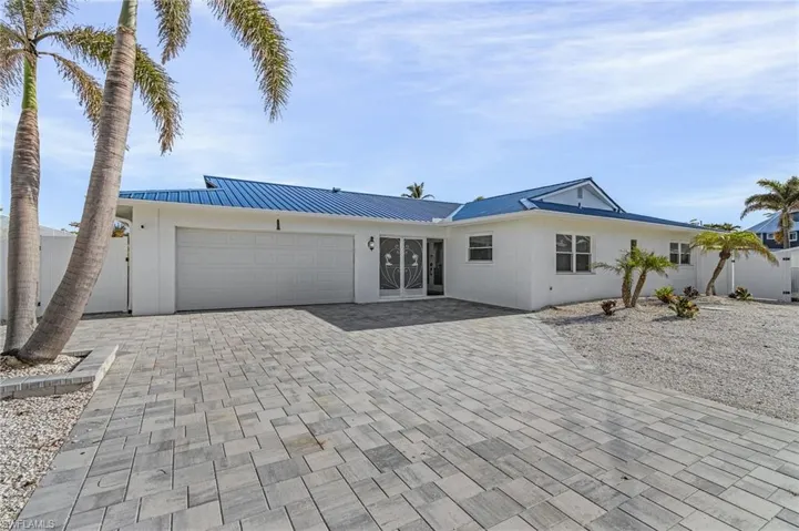 Ranch-style home with a garage