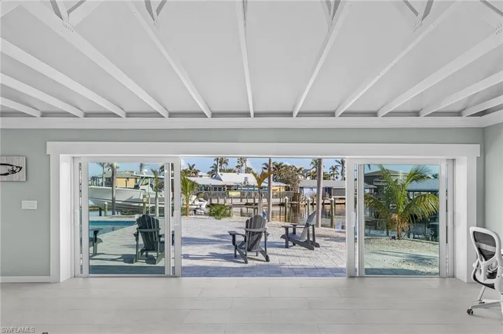 Doorway to outside with a water view