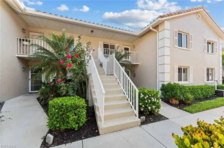 Beautiful landscaping abounds private entry