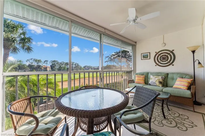 Sunroom / solarium with an outdoor hangout area and a ceiling fan