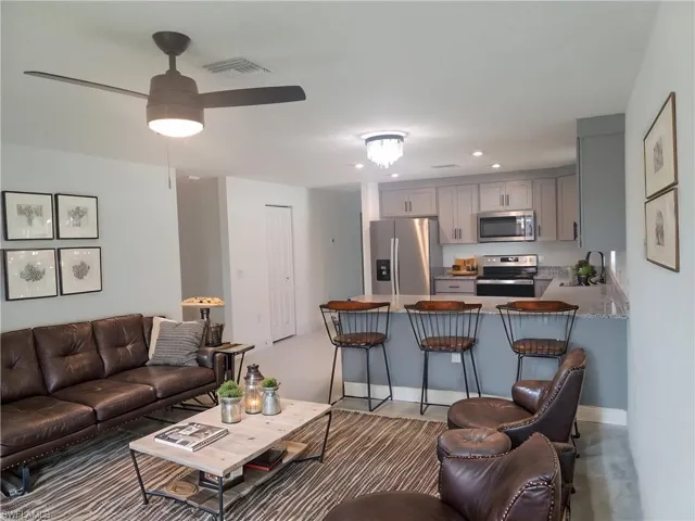 Living room with view of kitchen