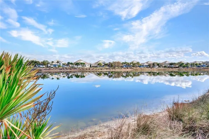 Water view featuring nearby suburban area