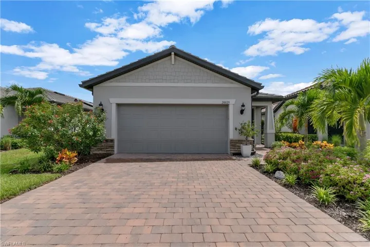 View of front of property with long driveway