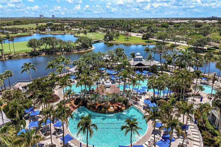 Aerial view of a nearby body of water and a golf course