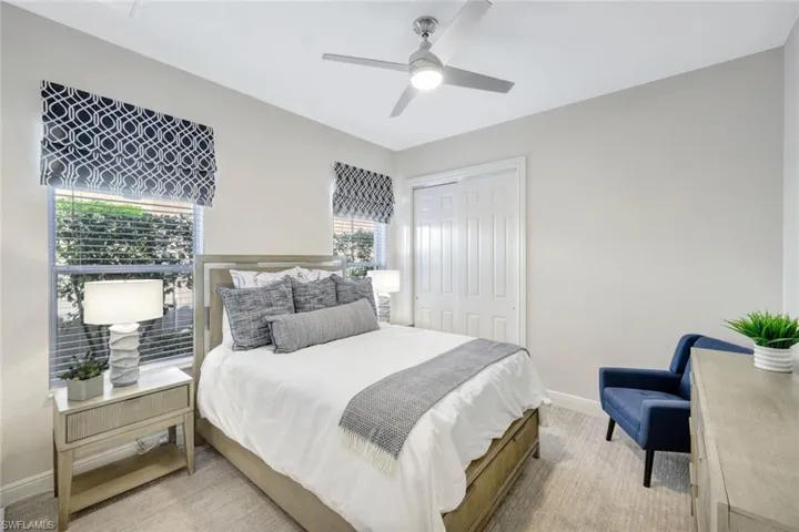 Bedroom featuring a closet and a ceiling fan