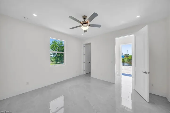 Spare room featuring a ceiling fan and recessed lighting