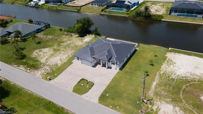 Bird's eye view with a residential view and a water view