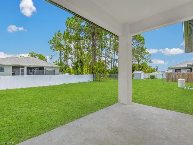 View of yard with a patio