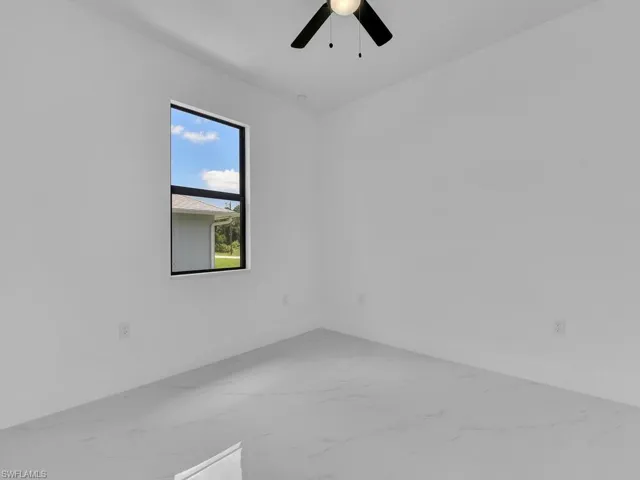 Spare room featuring ceiling fan