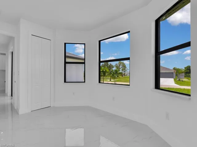 Spare room with tile patterned floors