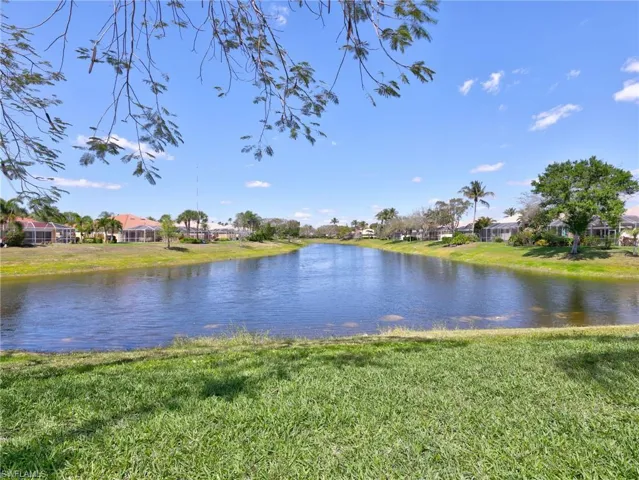 Water view featuring nearby suburban area