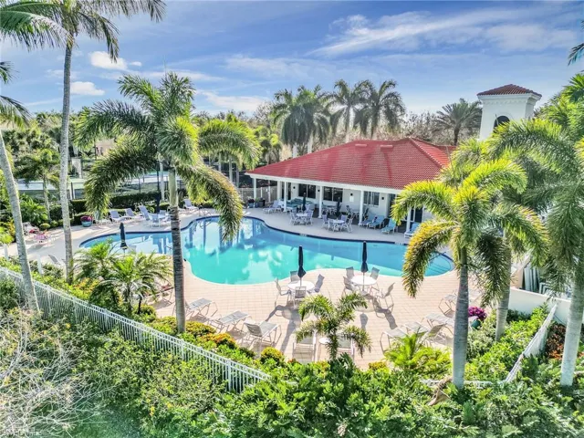 Community pool with a patio area