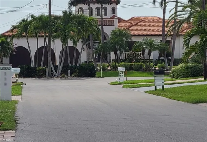 Wide street with high-end luxury homes