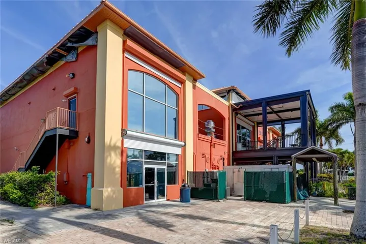 Rear view of house with a balcony