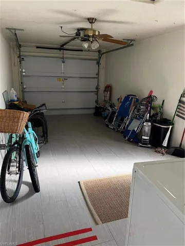 Garage featuring ceiling fan
