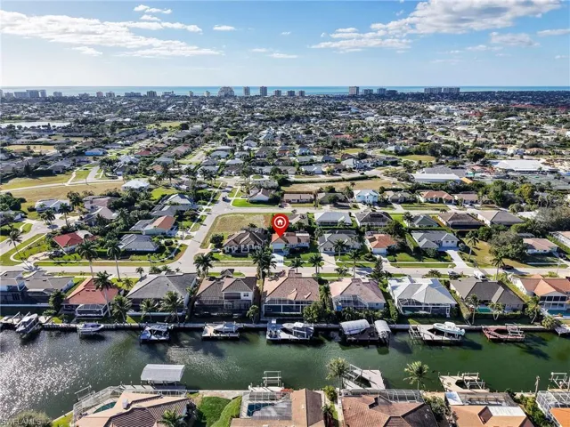 View of urban area featuring a large body of water and nearby suburban area