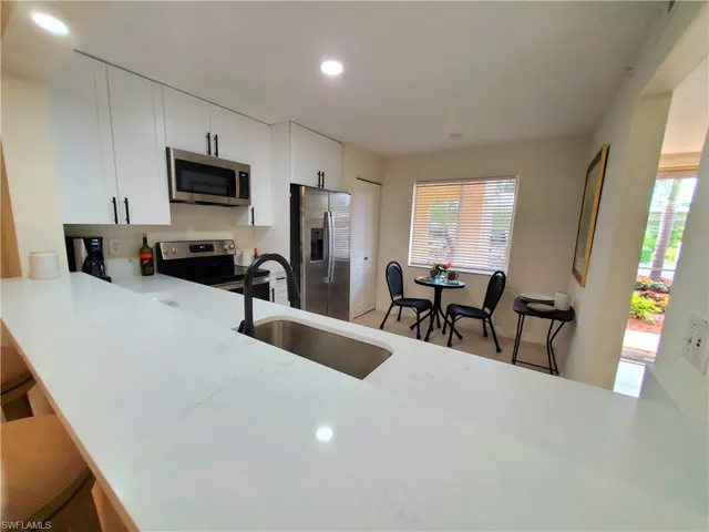1051  Eastham  WAY, Naples, FL 34104