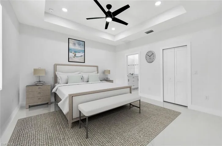 Bedroom featuring recessed lighting, a ceiling fan, and a closet
