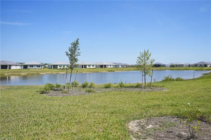 Water view featuring nearby suburban area