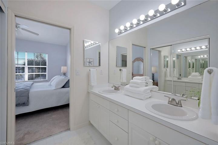 The Primary Bath closes with a pocketing door