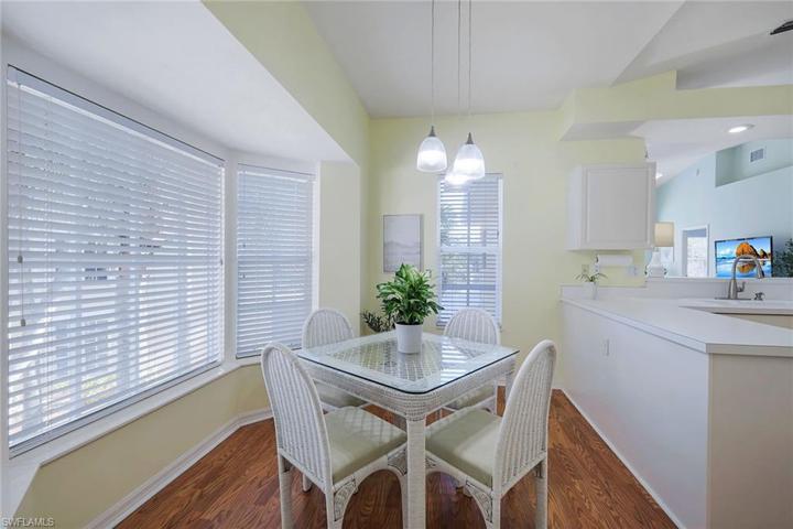 Dining Room is surrounded by Bay Windows offering a Lake View!
