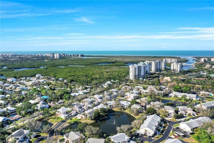 Come home to low density Coastal North Naples!