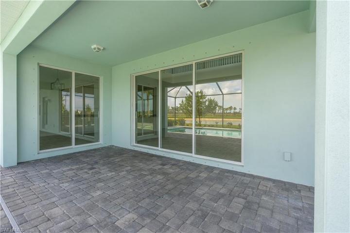 Covered Lanai with sliding glass doors