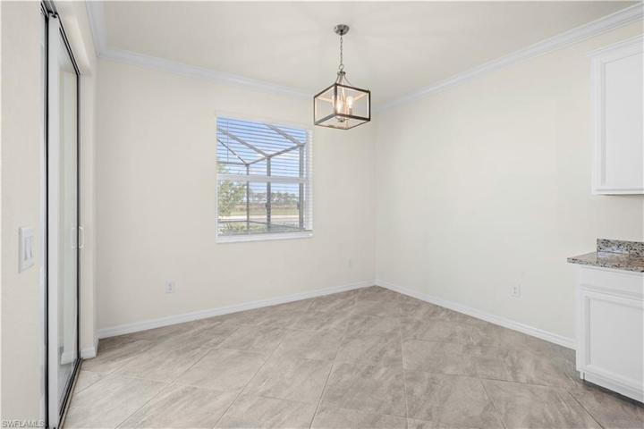 unstaged-dining nook in kitchen area