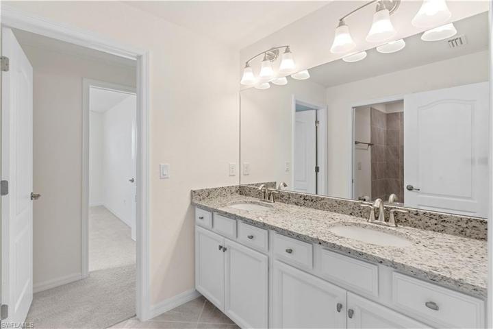 Jack and Jill style bath off the loft that services bedrooms #3 and #4