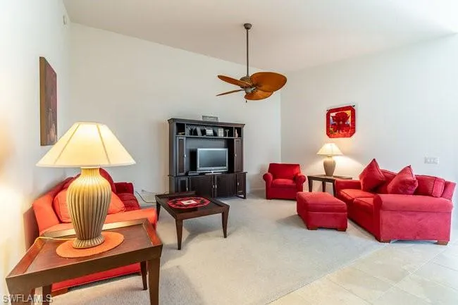 Tiled living room with ceiling fan
