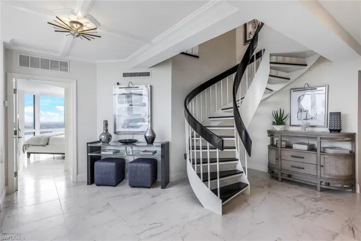 Entrance to downstairs guest suite and staircase to upper level