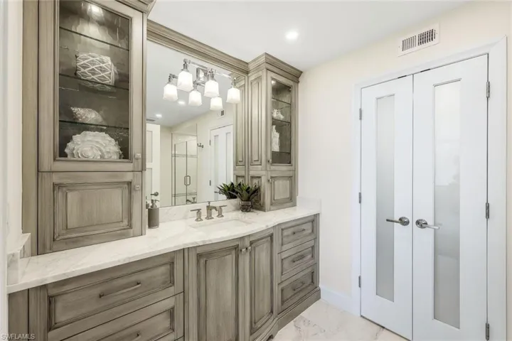 Primary bathroom (closet is behind doors)