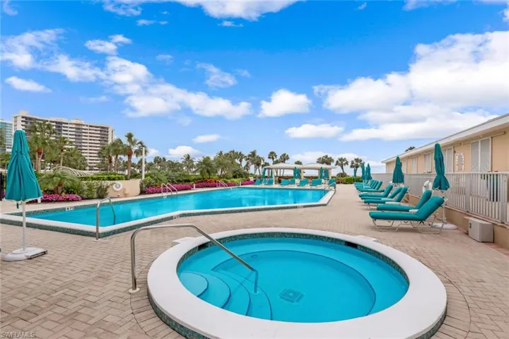 Amenity area including pool and spa