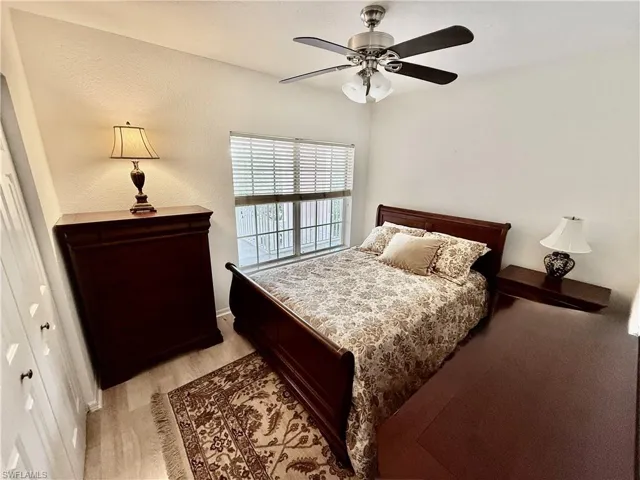 Bedroom featuring a ceiling fan and light wood-style floors