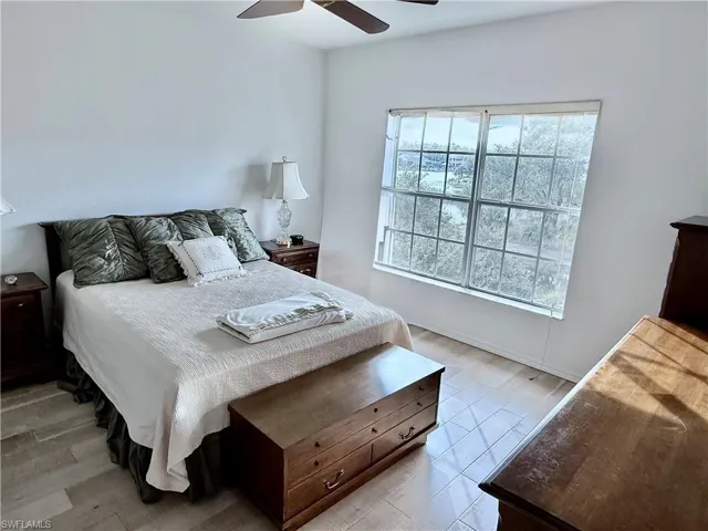 Bedroom featuring ceiling fan and light wood finished floors