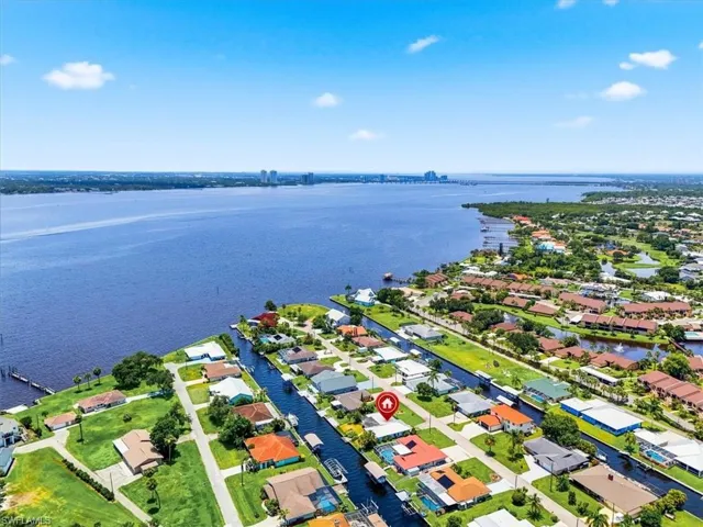 Waterfront community featuring canal access, coastal proximity, and a wide body of water
