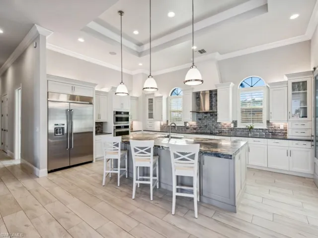 Jenn-Air luxury stainless steel appliances - massive column refrigerator/freezer, 5-burner induction cooktop, oven/microwave
