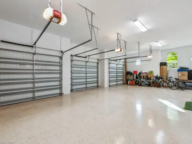 Oversized 3-car Garage with 3 separate hurricane rated doors, Epoxy finished floor