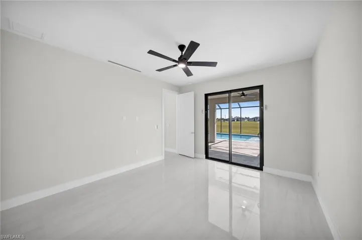 Unfurnished room with baseboards