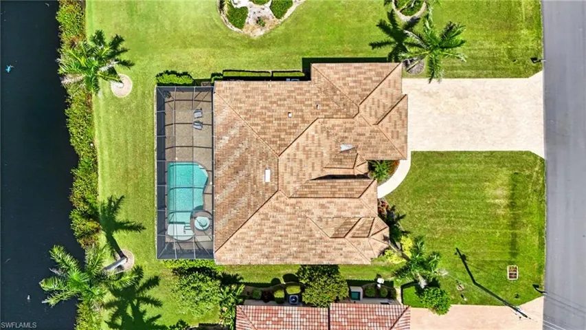 View of subject property with a pool area